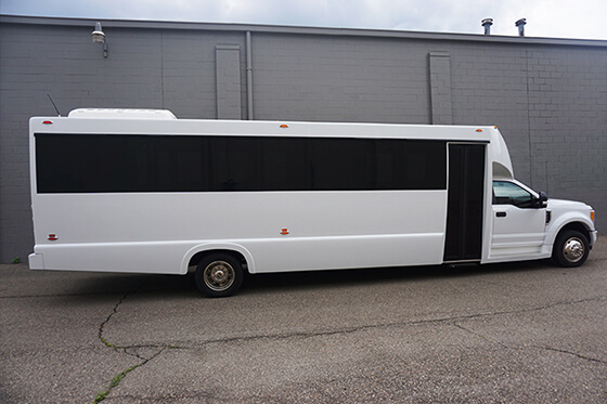 white passenger party bus